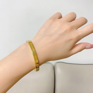Hermès Engraved Signature Slim Cuff Bracelet